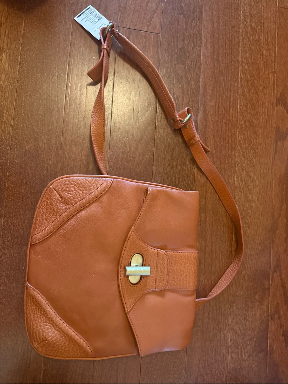 Brand new Kenneth Cole!!  Saffron Leather Crossbody Bag with Turn-Lock Closure
